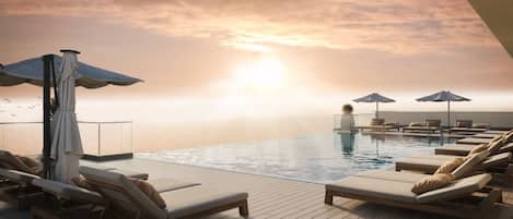 Outdoor pool, pool umbrellas, sun loungers