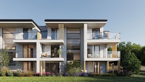 A modern multi-story residential building with balconies, large windows, and a well-maintained garden. - Baltic Season Spa Apartments (Grzybowo)