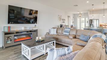 Télévision, cheminée, table de tennis de table