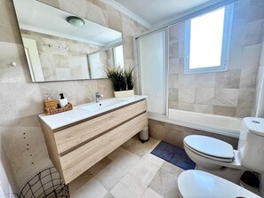 Hair dryer, towels, soap, toilet paper