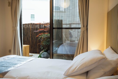 OPEN Sale! Walking distance from Umeda area / Modern Japanese/Western style rooms with Japanese-style tatami mats and garden view / Free bicycle rental