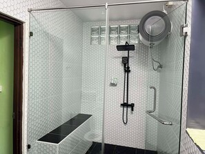 Shower, hair dryer, towels, soap