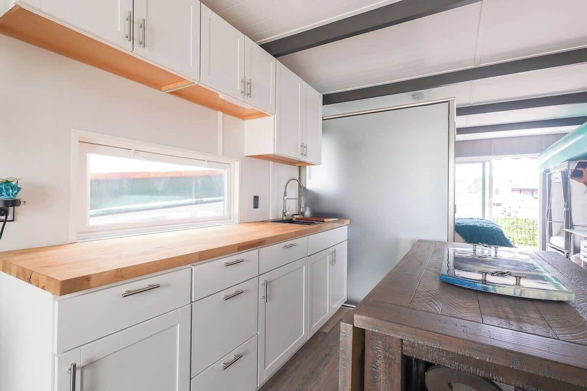 Microwave, stovetop, coffee/tea maker, cookware/dishes/utensils