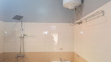 Shower, towels, soap, toilet paper