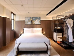 Literie de qualité, couette en duvet, articles de minibar gratuits