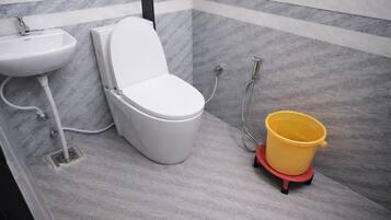 Shower, slippers, towels, soap