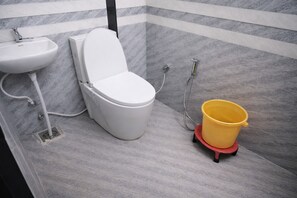 Shower, slippers, towels, soap