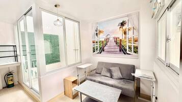 32-inch flat-screen TV with cable channels