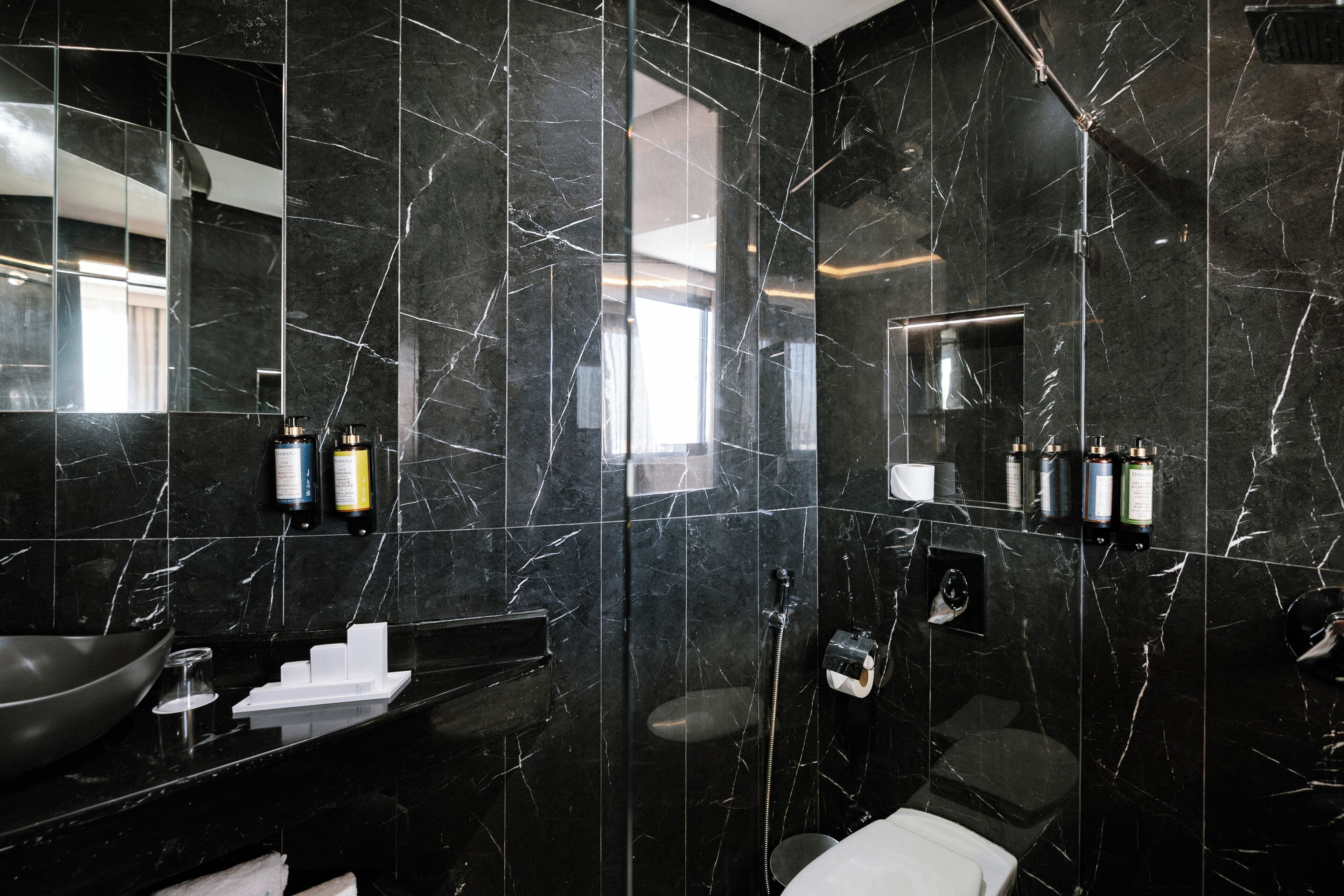 Shower, free toiletries, towels, shampoo