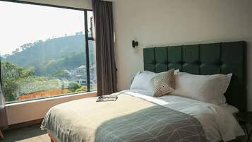 In-room safe, desk, laptop workspace, blackout curtains