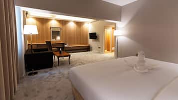 Signature King | Literie de qualité supérieure, surmatelas, minibar