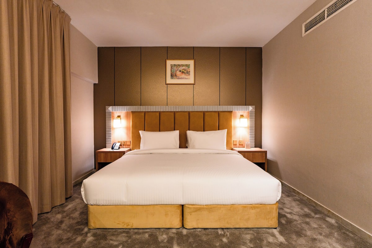 Modern King | Coffres-forts dans les chambres, fer et planche Ă repasser