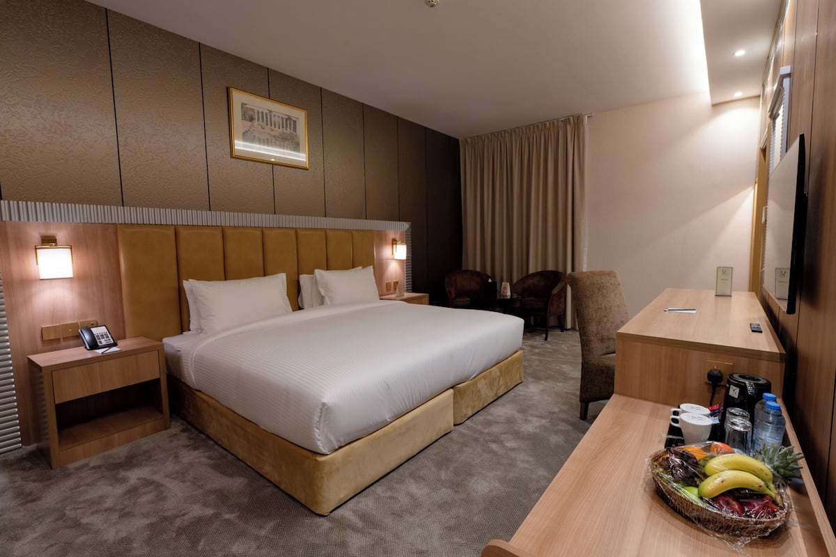 Grand Suite King | เครื่องนอนระดับพรีเมียม, เตียงพร้อมฟูกเสริมที่นอน, มินิบาร์