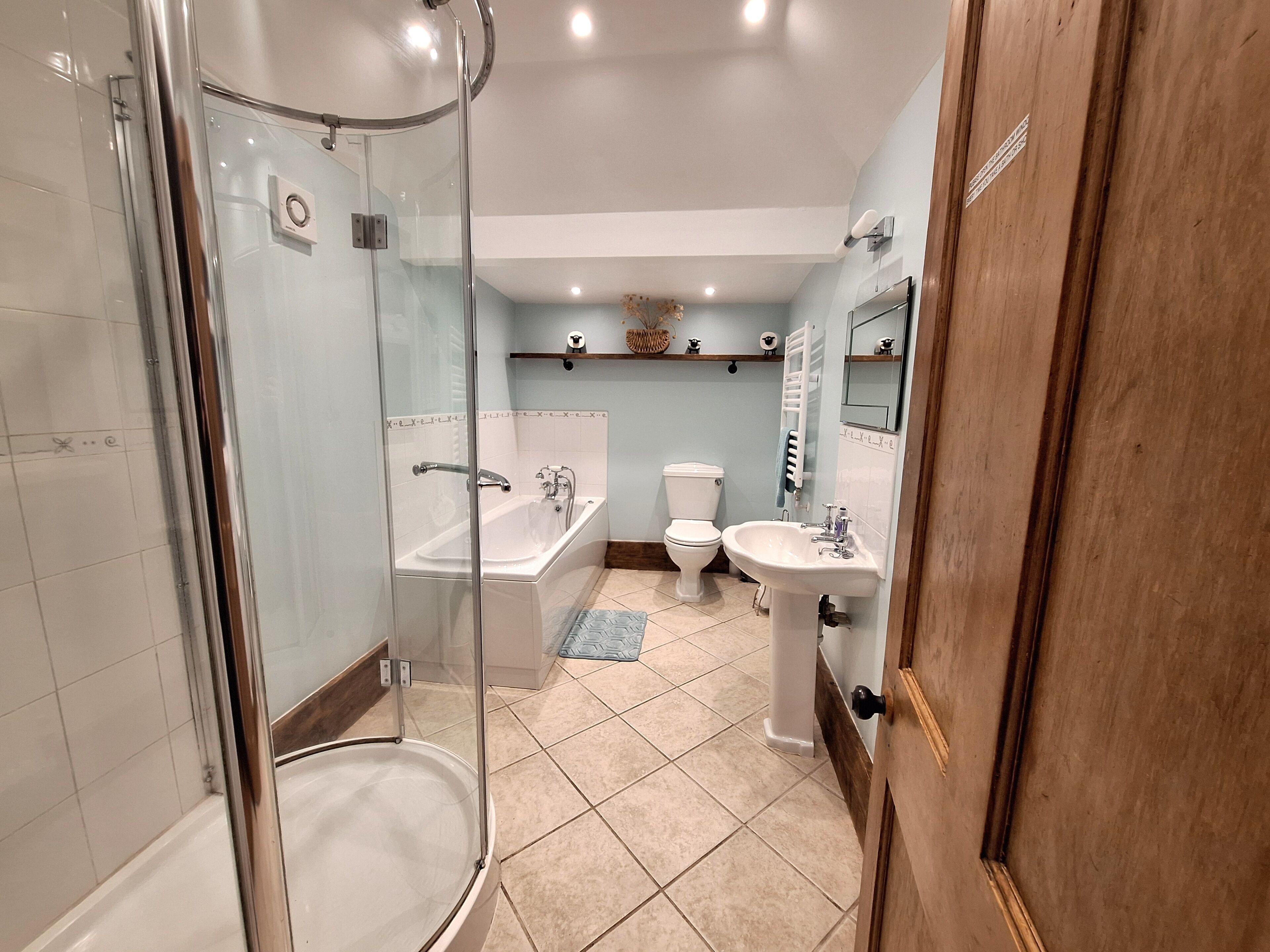 Family bathroom with separate shower cubicle, bath and W.C. 