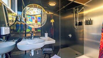 Shower, towels, soap, toilet paper