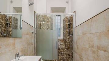 Shower, hair dryer, shampoo