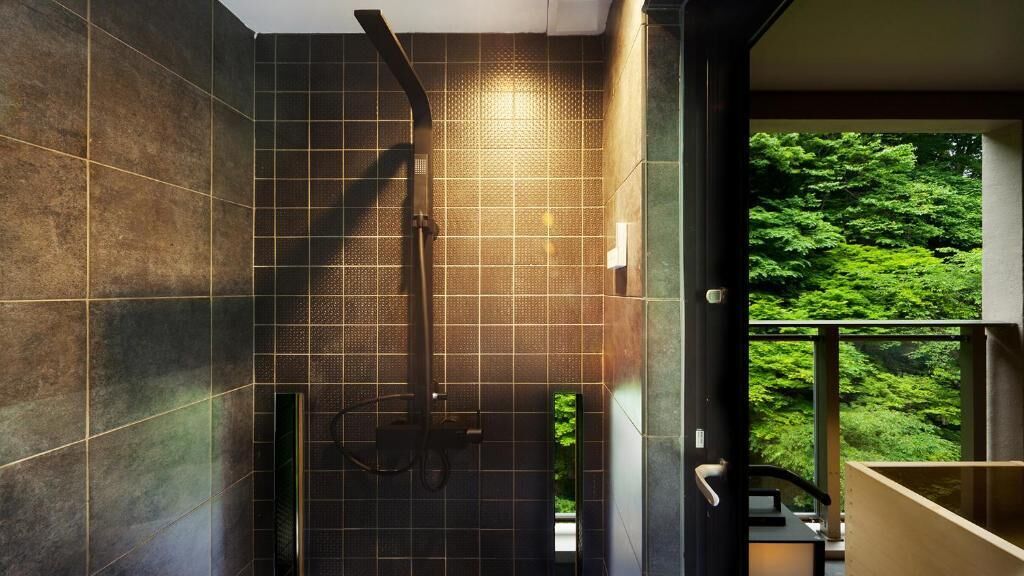 Junior Suite, Non Smoking, Mountain View | Bathroom | Spring water tub, rainfall showerhead, hair dryer, slippers