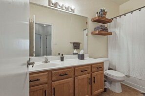 Hair dryer, towels, soap, toilet paper