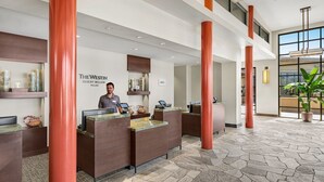 A reception area with a modern design, featuring a receptionist, a sign for 'The Westin Desert Willow Villas', and a large window providing natural light. - 1 Bed-room Villa with full kitchen in Palm Desert from 4/7/2026 for 5 nights (Palm Desert)