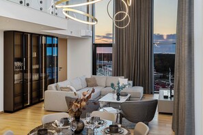 Living area - Elegant luxury penthouse, with panoramic Tallinn views, private sauna & parking. (Tallinn)