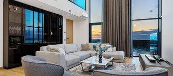 Elegant luxury penthouse, with panoramic Tallinn views, private sauna & parking.