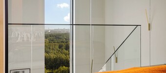 Elegant luxury penthouse, with panoramic Tallinn views, private sauna & parking.