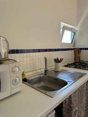 Mikrobølgeovn og kokeplater