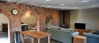 A spacious, dog friendly, country cottage with riverside walks and a pub nearby.