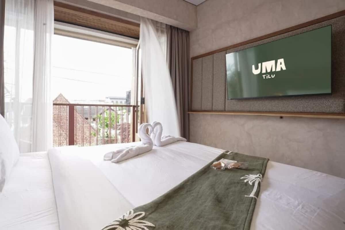 Kahden hengen deluxe-huone, parveke | Ilmainen Wi-Fi
