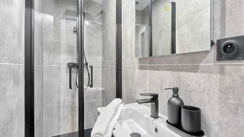 Shower, hair dryer, shampoo