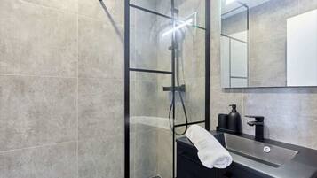 Shower, hair dryer, shampoo