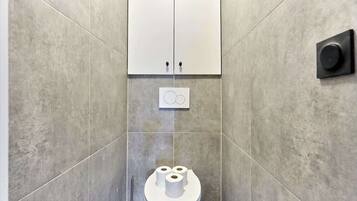 Shower, hair dryer, shampoo