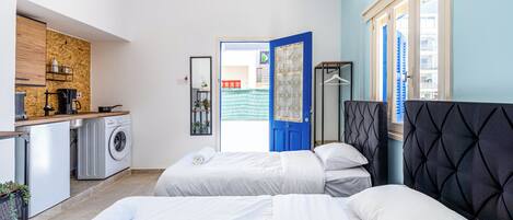 Studio, 2 lits une place, coin cuisine, vue ville | Vue de la chambre