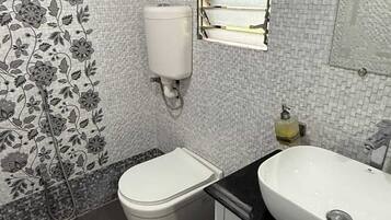 Shower, free toiletries, towels, soap