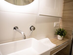 Secador de pelo y toallas