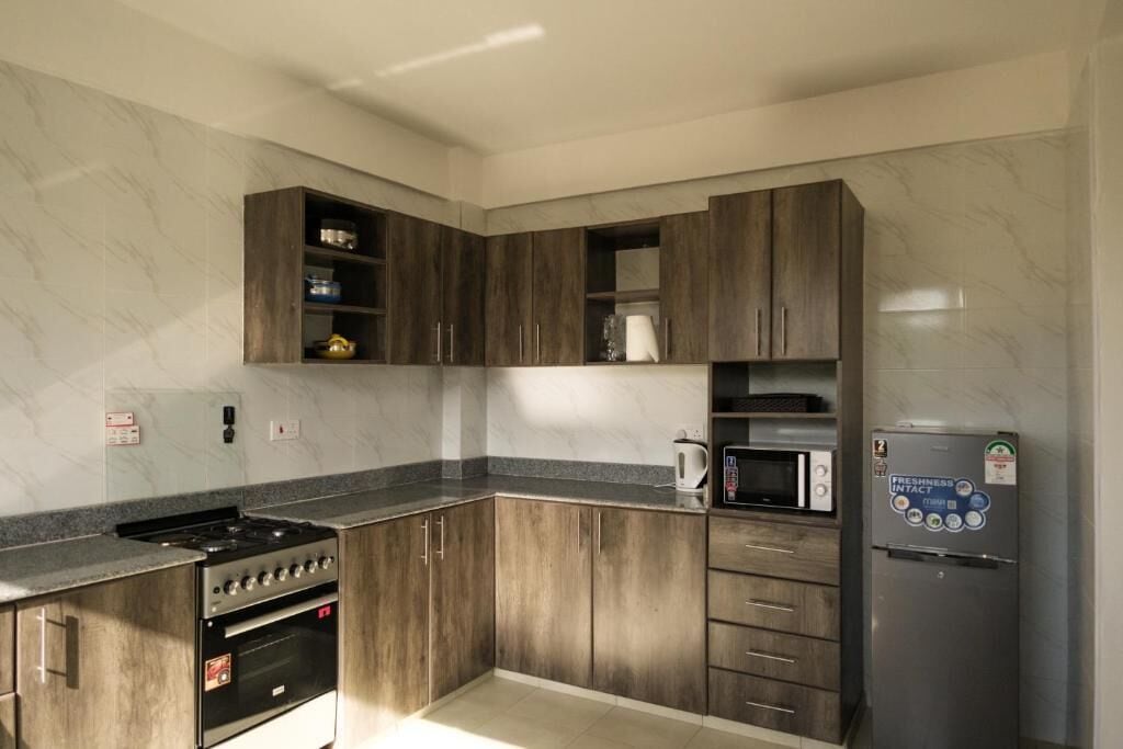 Leilighet – deluxe, byutsikt | Eget kjøkken | Kjøleskap, mikrobølgeovn, vannkoker og kjøkkenutstyr