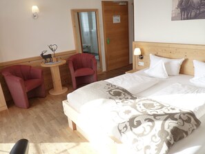 Comfort Suite, Balcony, Garden View | In-room safe, blackout drapes, soundproofing, free WiFi