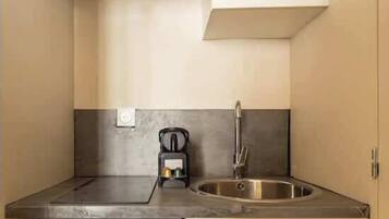 Fridge, coffee/tea maker, electric kettle, toaster