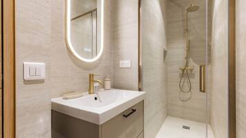 Shower, hair dryer, shampoo