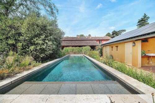 Holiday Home 'Le Galet Du Chant Du Buc' with Shared Pool, Private Garden and Wi-Fi