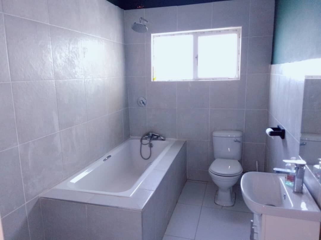 Shower, towels, soap, toilet paper