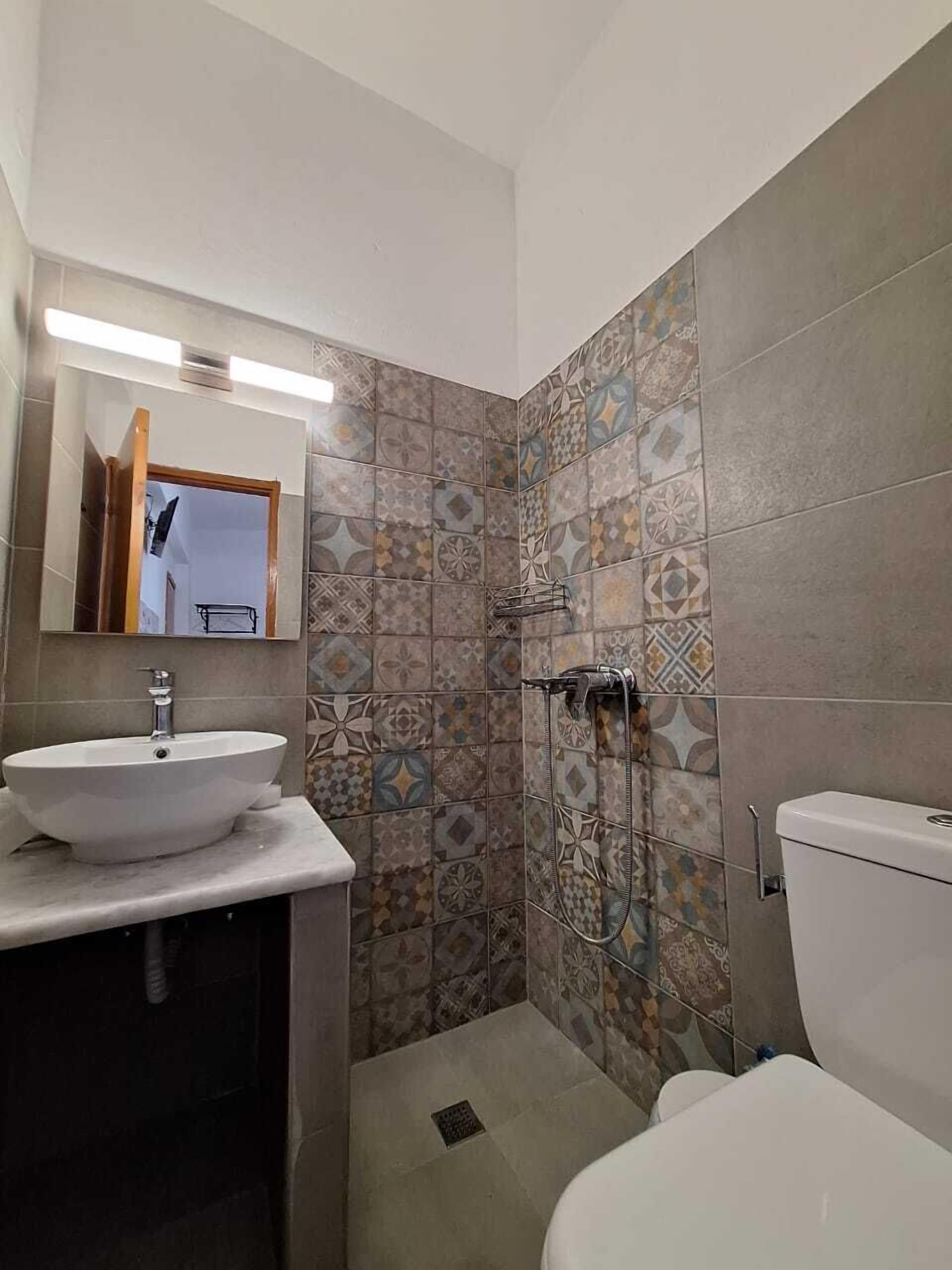 Standard Double Room, Balcony, Sea View | Bathroom | Shower, hair dryer, towels, soap