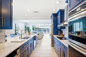 Fridge, microwave, oven, stovetop - Yacht Club Waterfront Home 4BR + Den & Pool (Indian Rocks Beach)