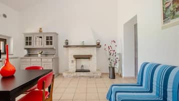 Classic Apartment, Patio, Garden View | Living room | 24-inch flat-screen TV with digital channels