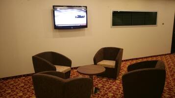 82-inch plasma TV with premium TV channels, video game console, Netflix