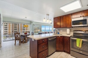 Fridge, microwave, oven, stovetop - Ilikai Hotel Condo with Ocean, Lagoon & Fireworks Views (Honolulu)