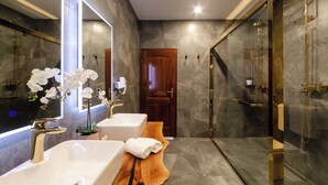 A modern bathroom with two sinks, a large mirror, and a shower area. - Superior 1-bedroom S2 (Rovinj)