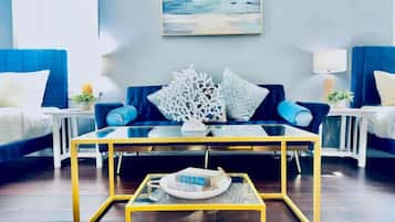 Studio, Multiple Beds, Kitchenette, Garden View (Surf + Strand Unit B) | Living area