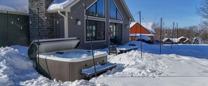 Outdoor spa tub - Family-Friendly Ski Lodge: Game Room, Fire Pit and Hot Tub (Boyne City)