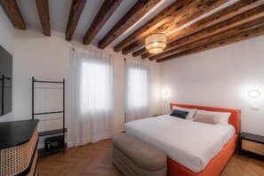 Appartement Confort | Literie de qualité, couette en duvet, fer et planche à repasser